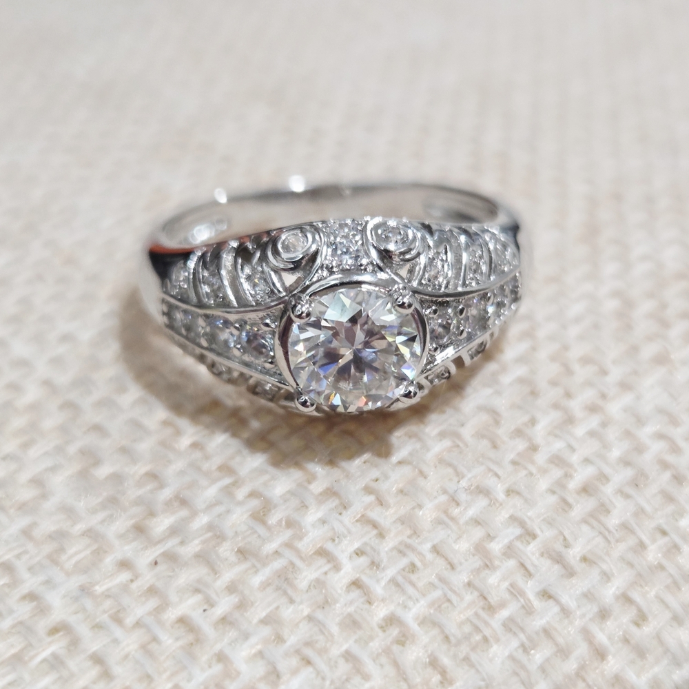 Stunning White Gold Moissanite And Filigree Ring